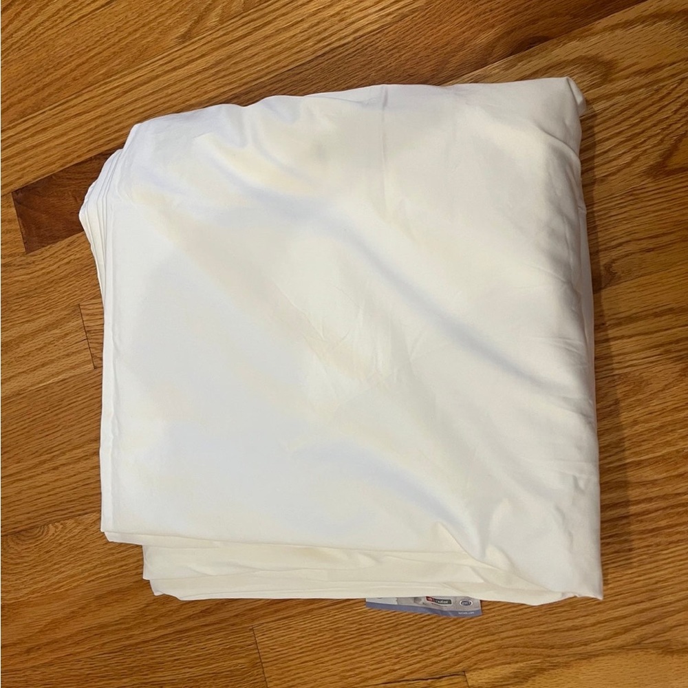 New king  white flat sheet. Was part of a split king set. Cotton and viscose.